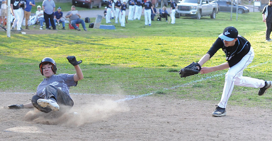 4-20 tug ethan varney slide into home.jpg